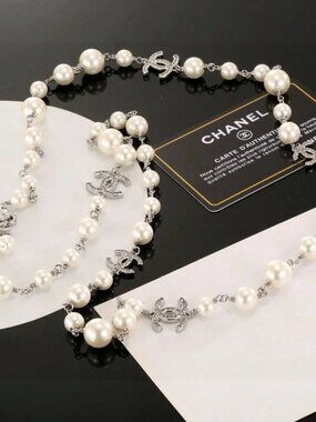 Chanel pearl sweater chain